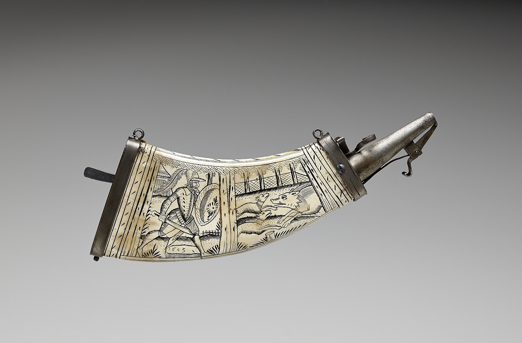 Gunpowder horn with engraving: "Hunter with shield and hunting trousse with two dogs on boar hunt", 1603, pressed cow horn, metal, inv. no. WA 38