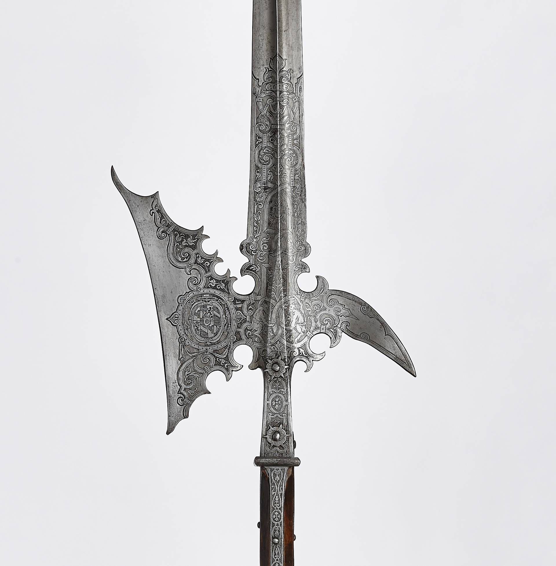 Halberd of Archbishop Wolf Dietrich’s bodyguard, ornamental high etching with coat of arms and “Teuferln” (little devils), 1611, iron, inv. no. WA 1066